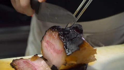 Chopping pork slices Stock Footage 86579323