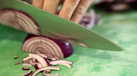 Chopping a red onion Stock Footage 60443173