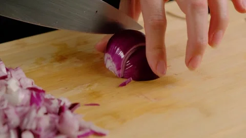 Chopping Red Onions with Chef's Knife in Cooking Kitchen Stock Footage 341432841