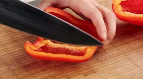 Chopping a red pepper 스톡 동영상 24672650