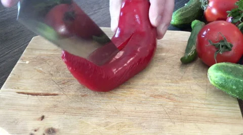 Chopping a red pepper roughly Stock Footage 48137308
