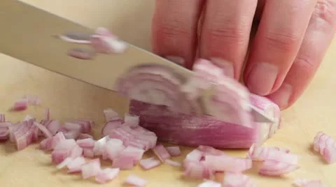 Chopping shallot finely Stock-Footage 24665856