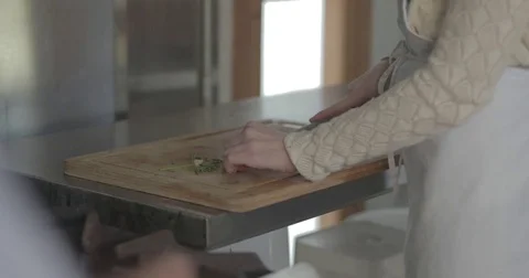 Chopping spices on a cutting board Stock Footage 76413312