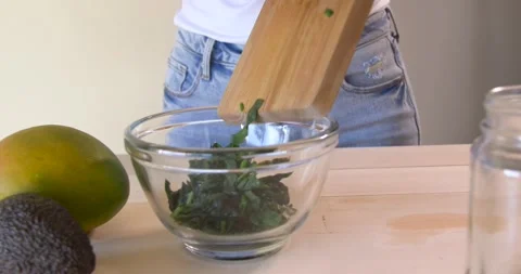Chopping spinace Stock Footage 148184107