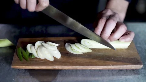 Chopping spring onion Stock Footage 127884577