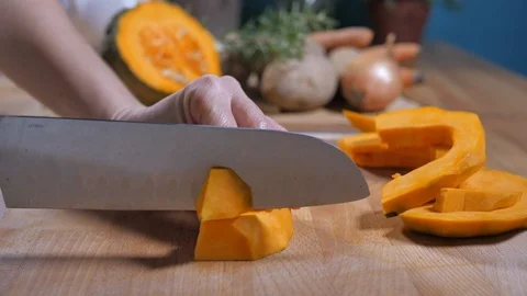 Chopping squash  Stock Footage 104552296