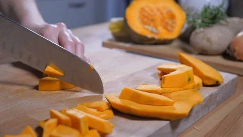 Chopping squash  Stock Footage 104552313