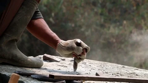 Chopping A Stone With A Chisel And A Hammer Video stock 85281104