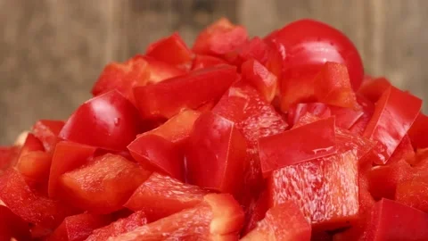 Chopping Sweet peppers close-up. Loop motion. Side view. Stock Footage 161345660