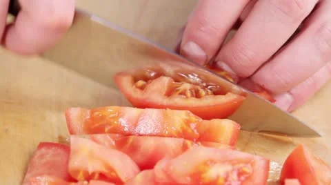 Chopping tomato Stock Footage 24654994