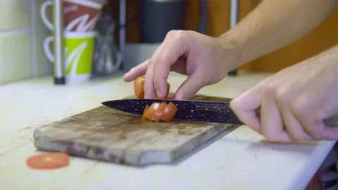 Chopping tomato for salad, chef fast hands, diced tomato Stock-Footage 219623773