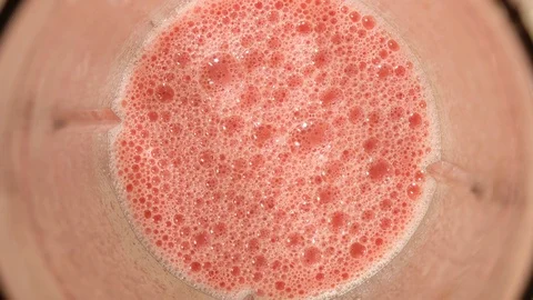 Chopping tomatoes in a blender. View from inside the blender. Close up Stock Footage 112262955