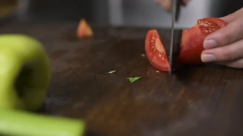 Chopping tomatos Stock Footage 57238387