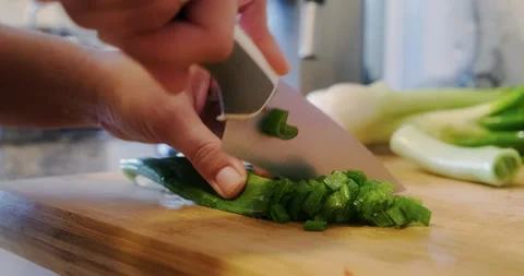 Chopping Vegeatables with Knife, leeks Stock Footage