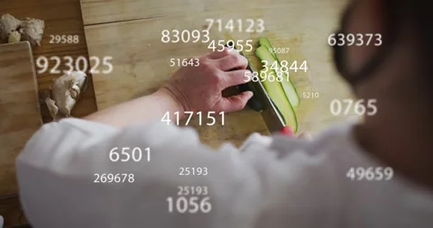 Chopping vegetables, chef's hands with numbers over indicating data processing Stock Footage 327526136
