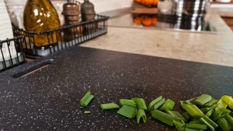 Chopping vegetables on cutting board - stop motion Video stock 73916908