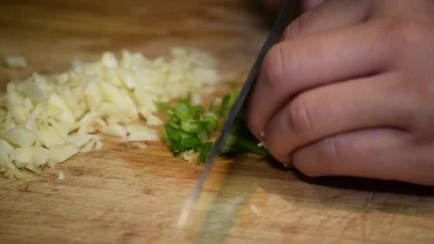 Chopping vegetables with kitchen, and cooking. Stock Footage 305808459