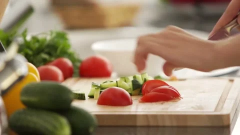 Chopping Vegetables in the Kitchen Stock Footage 305281711