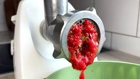 Chopping vegetables in a meat grinder Stock Footage 293331701