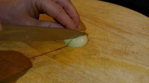 Chopping a white onion Stock Footage 121449166