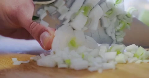 Chopping white onions in the kitchen Stock-Footage 145873678