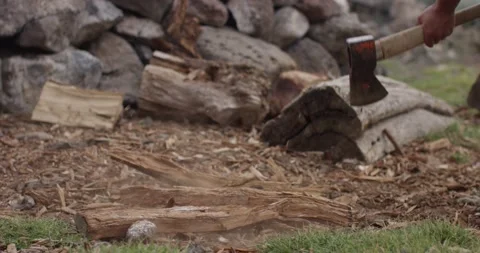 Chopping wood with an axe close up slow motion Stock Footage 172933183