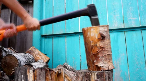 Chopping wood with axe Stock Footage 23521197