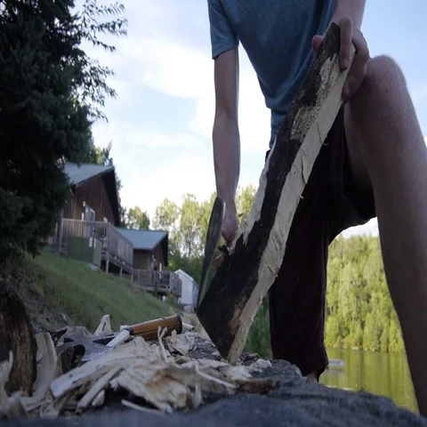 Chopping wood with axe - Slow motion - 60 FPS Stock Footage 69333982