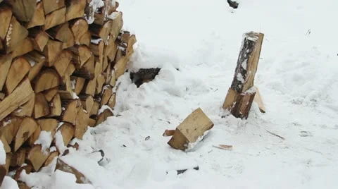 Chopping wood in frosty winter. Stock Footage