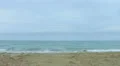 Choppy sea water, waves splashing, wind blowing on the beach. Stormy weather 4k or 4k+ Resolution