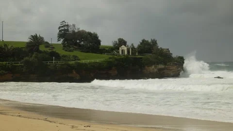 Choppy waters causing sea spray around Dolphins Point in Sydney 6K Stock Footage 305886347