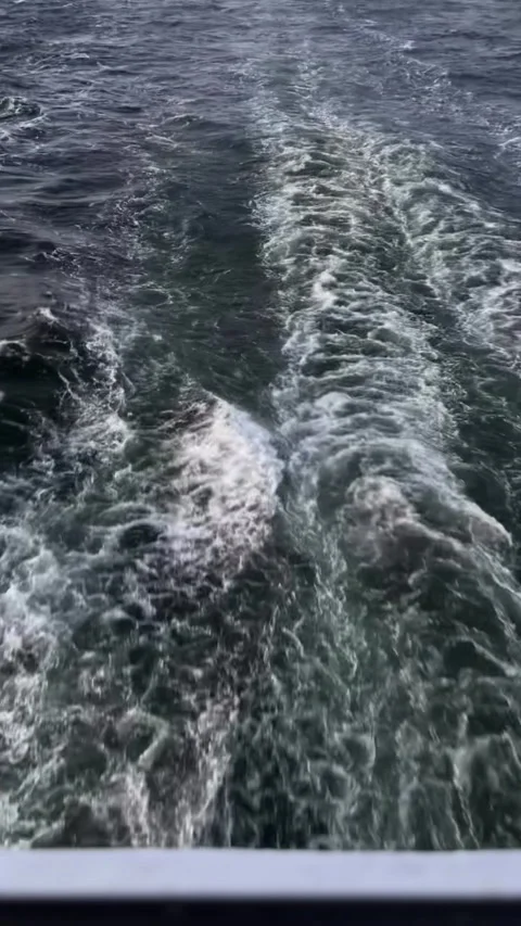 Choppy Waters Waves Being Formed by the Passage of a Moving Vessel on the Vast Stockbeeldmateriaal 306077573