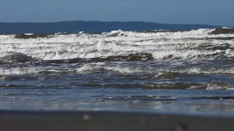 Choppy waves on the  shore Stock Footage 104617747