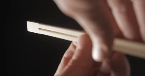 Chopsticks close up in vertical view 4K, asian culture Stock Footage 260137279