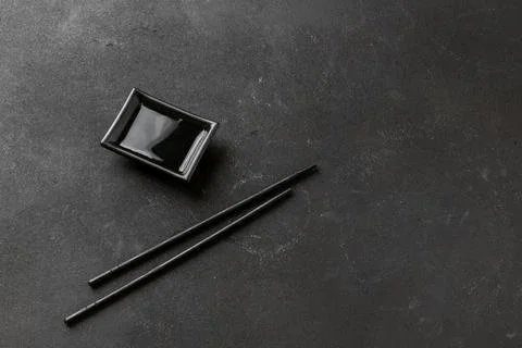 Chopsticks on dark table. Top view and copy space Stock Photos