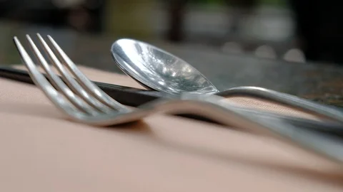Chopsticks fork and spoon on the table in the wild restaurant Stock Footage 108672906