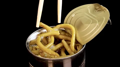 Chopsticks Picking Haricot Beans from Open Canned Food Stock Footage 313786985
