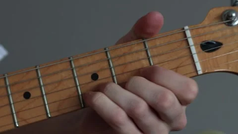 Chord progression on a guitar neck Stock Footage 333462739