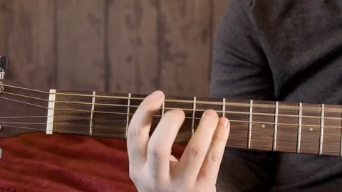 Chords on an acousic Stock Footage 130151165