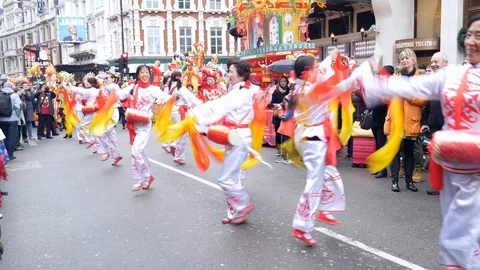 Choreographed dancers take part in the celebration of Chinese New Year in London Stock Footage 102867216