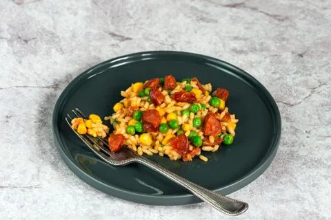 Chorizo and pea risotto Stock Photos