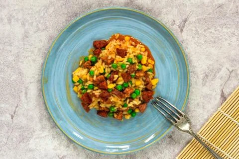 Chorizo and pea risotto Stock Photos