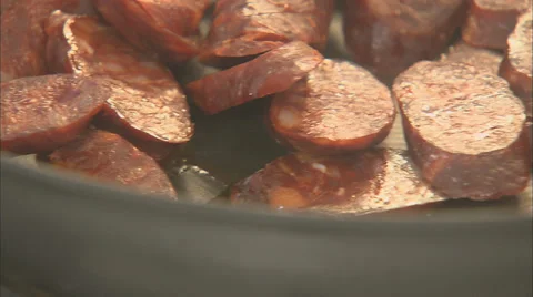 Chorizo being shallow fried Stock-Footage 39588410