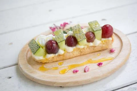 Choux cream with fruit Stock Photos