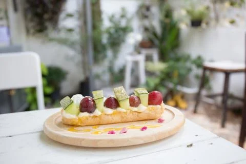 Choux cream with fruit Stock Photos