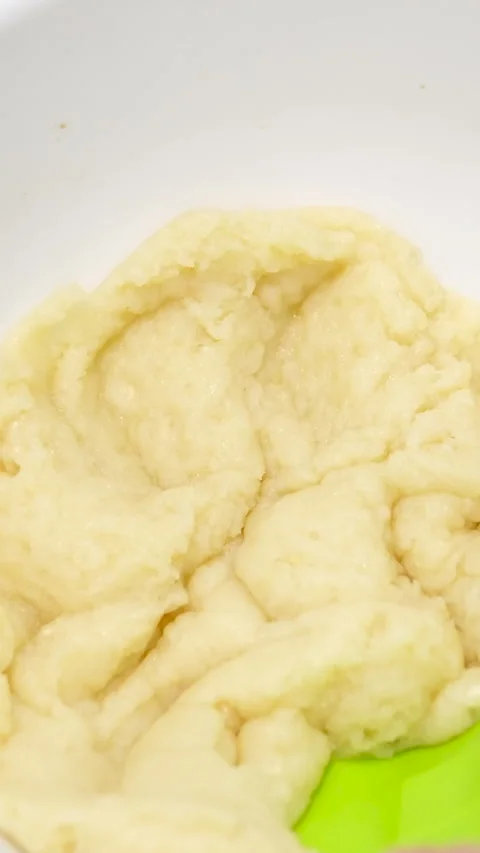 Choux pastry for eclairs. Making small eclairs with help of pastry bag. Piping Stock Footage 279910497