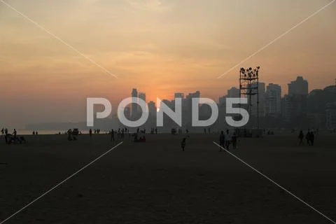 Chowpatty beach Mumbai at sunset. Stock Photos