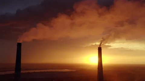 CHP chimneys smoke against the backdrop of an epic sunset. Stock Footage 194969776