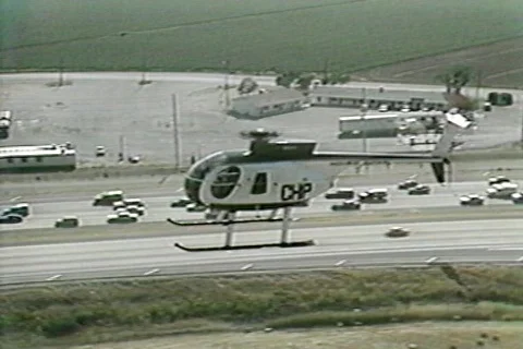 CHP Helicopter Flies over Freeway Stock Footage 567645