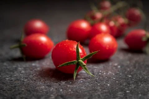 Chrerry tomatoes on dark background Foto stock